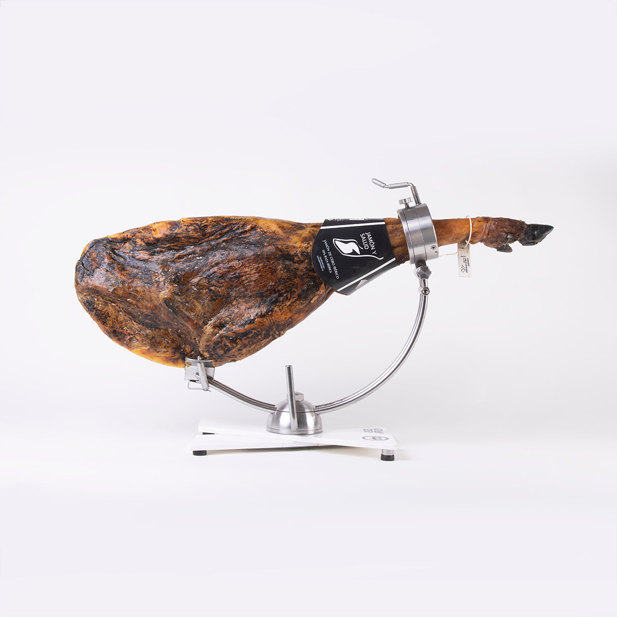 pata de jamón de cebo ibérico etiqueta negra jamón y salud en jamonero de acero
