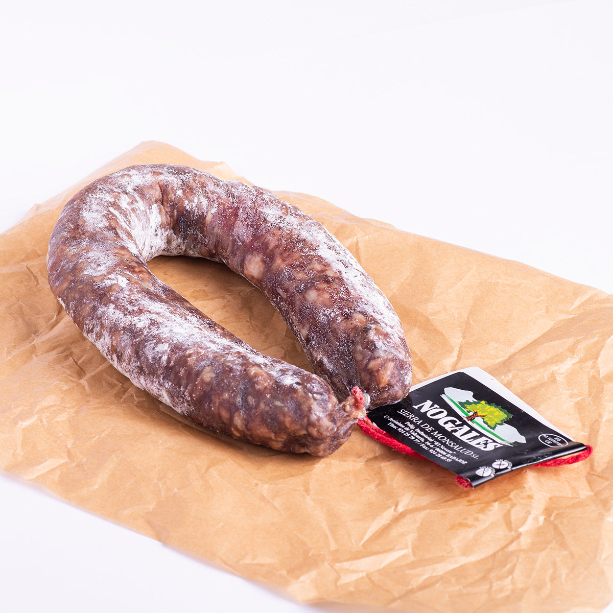 salchichón ibérico de herradura etiqueta nogales sobre papel alimentario