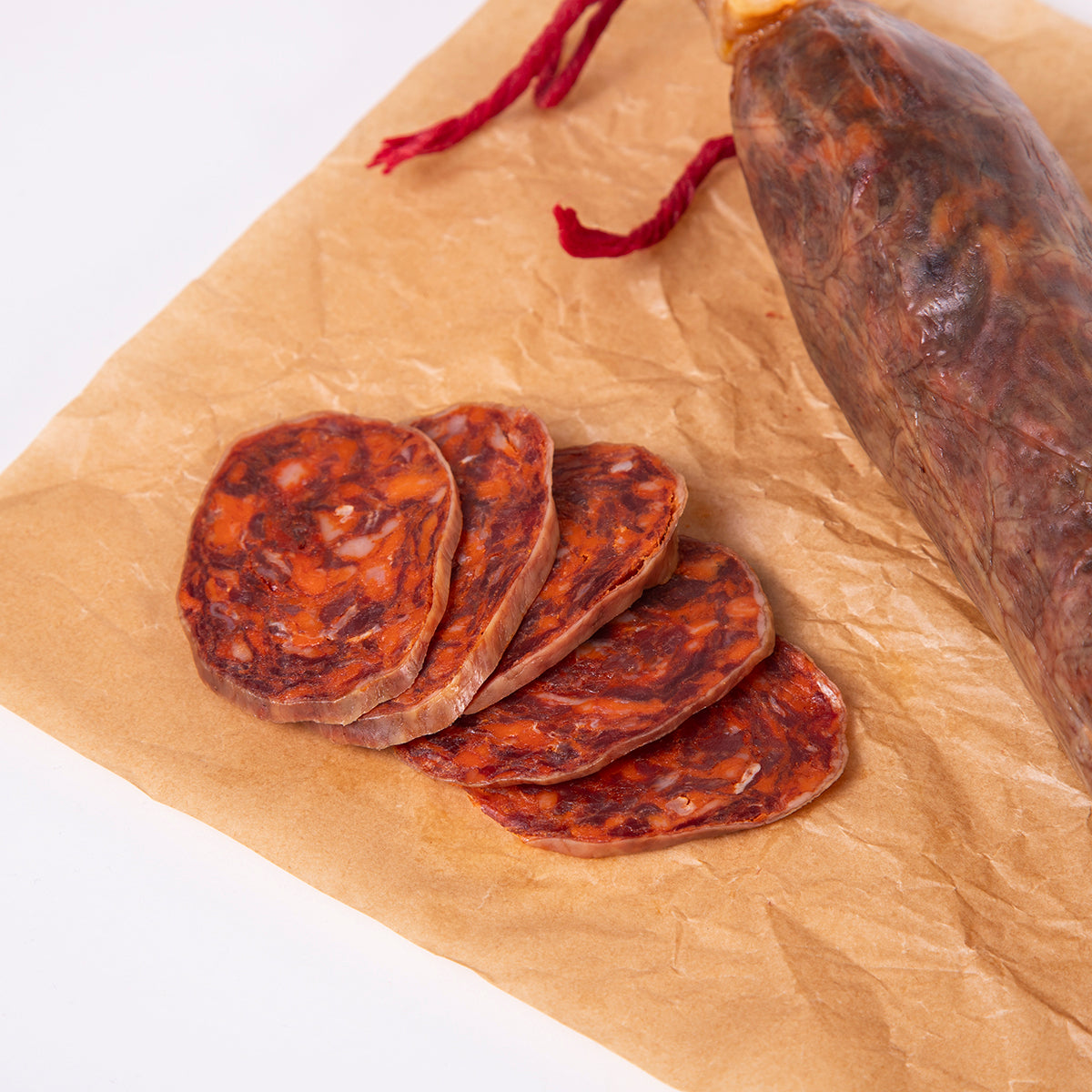 detalle rodajas de chorizo rojo de tripa natural